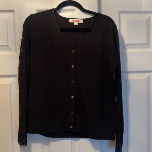 Black sweater size large. Lace sleeve detail. Never worn.